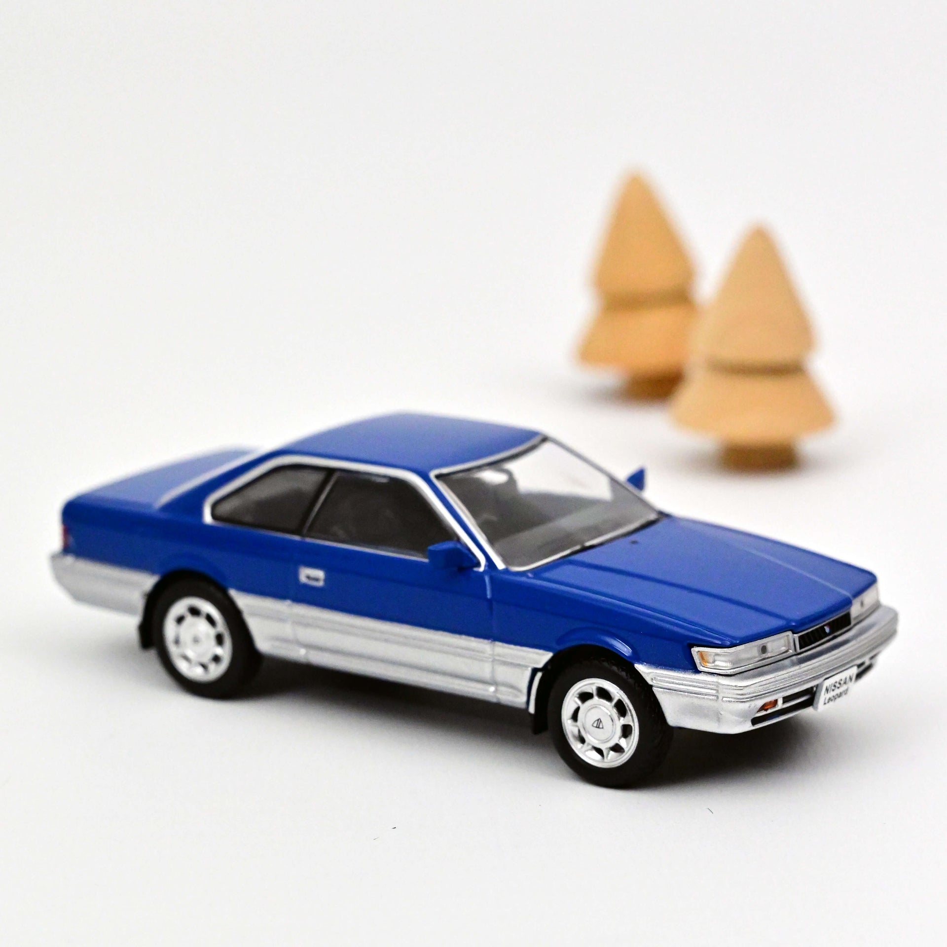norev-nissan-leopard-f31-1986-1-43-die-cast-blu-metallizzato image 1