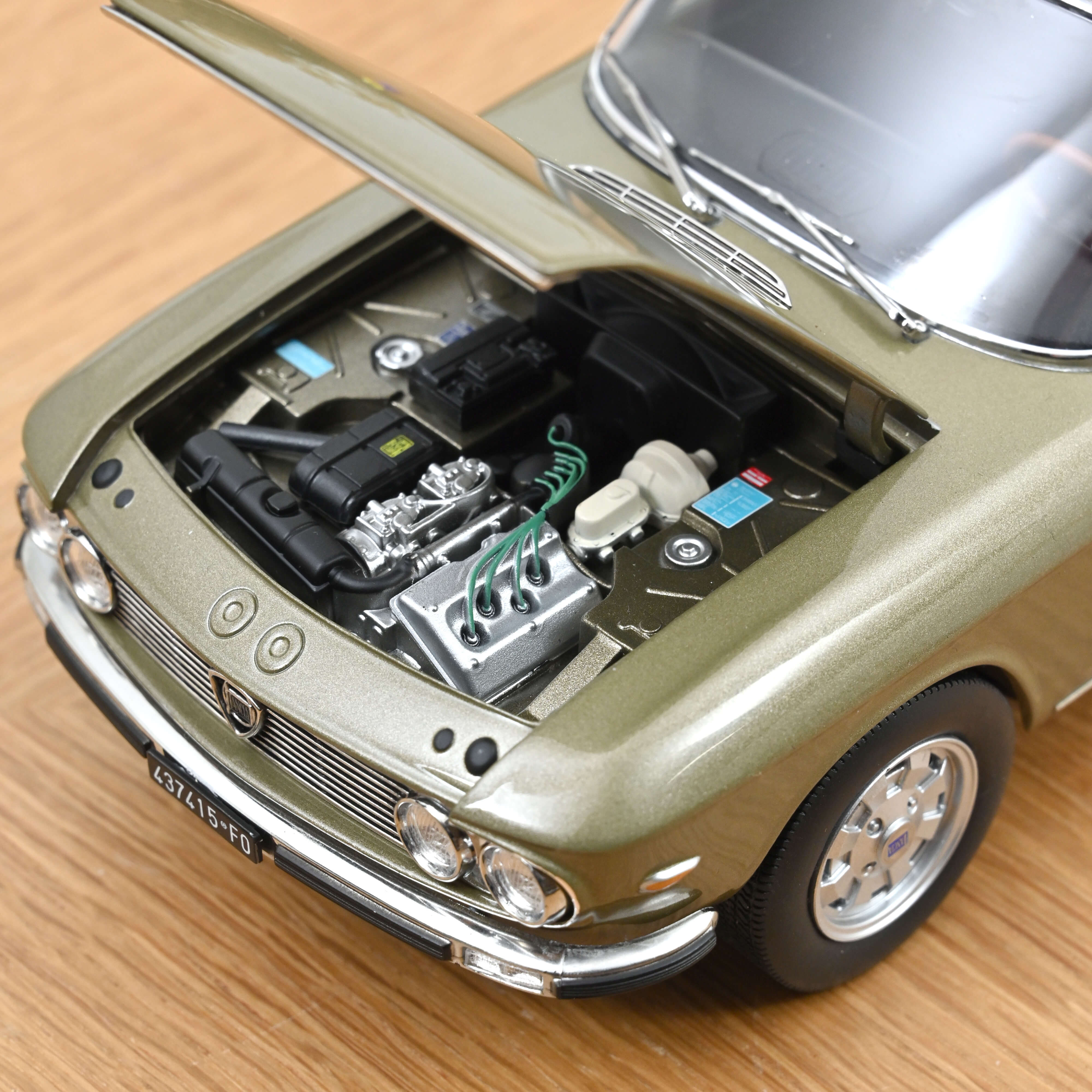 norev-lancia-fulvia-1971-modellino-auto-1-18-bronzo-longchamps image 5