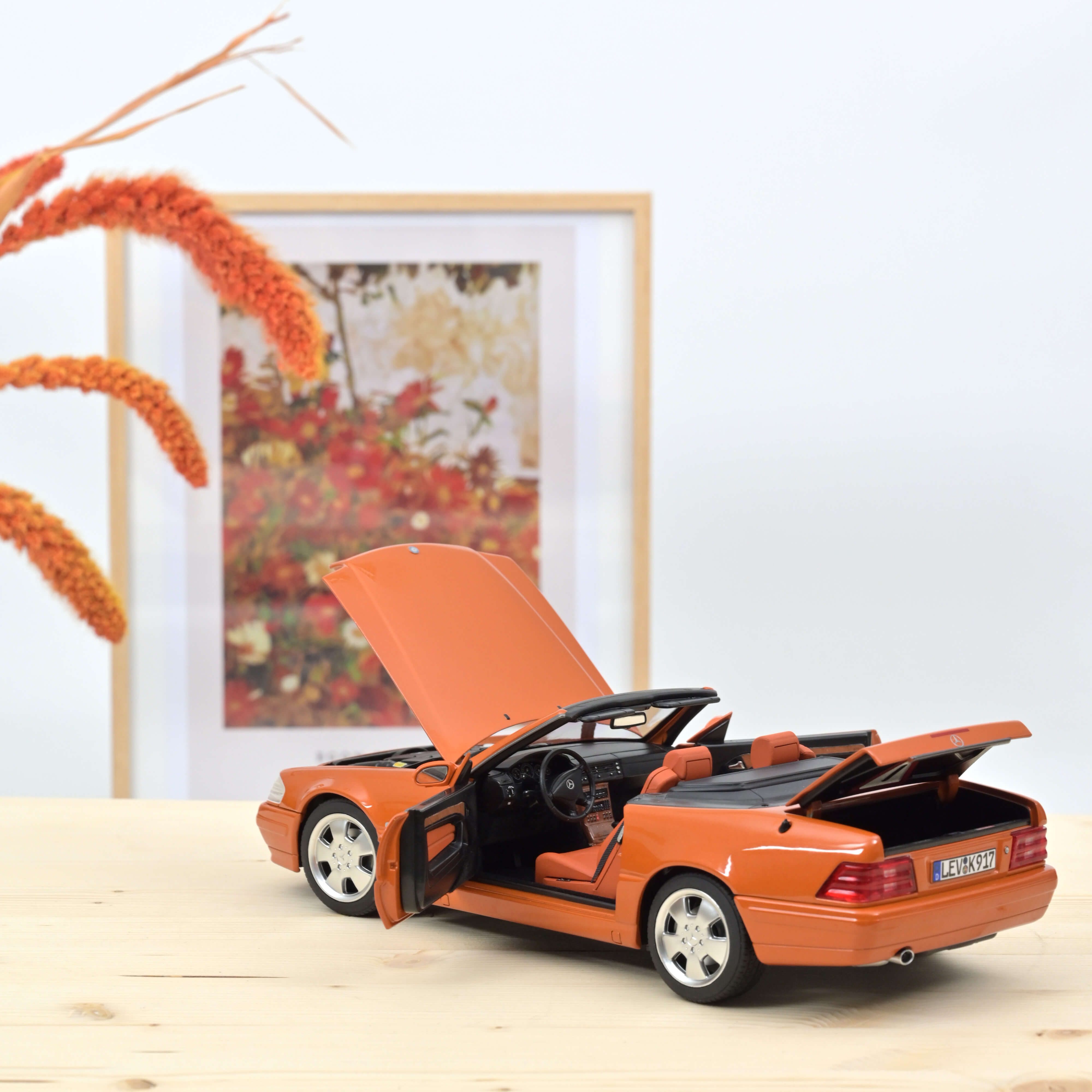 norev-mercedes-benz-sl-500-1999-arancione-metallizzato-1-18-200-pz-web-excl image 3
