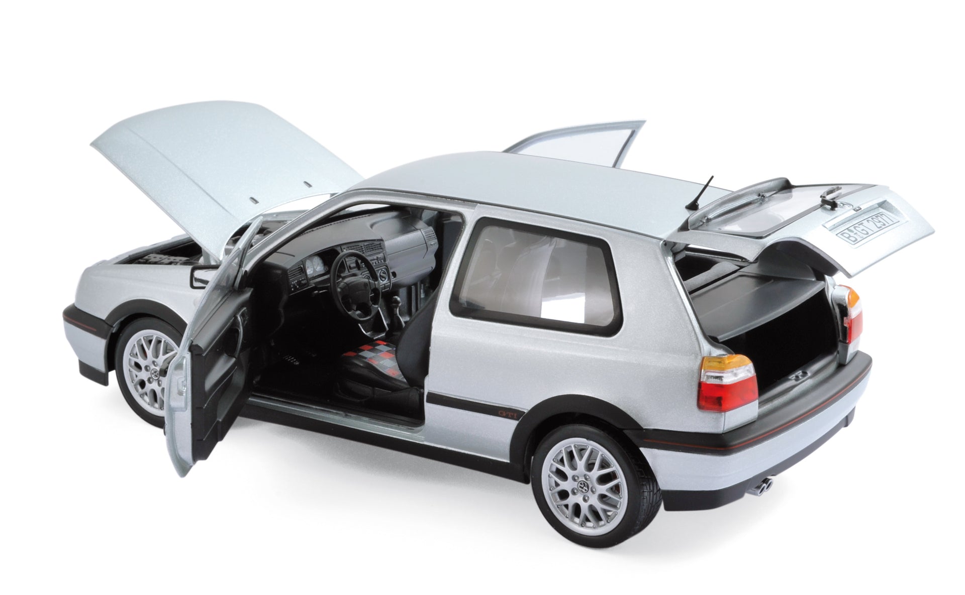 norev-vw-golf-gti-20th-anniversary-1996-argento-modellino-auto-1-18 image 1