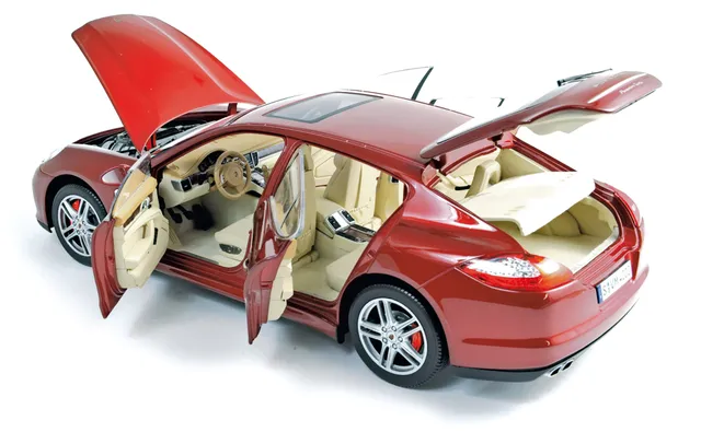 norev-porsche-panamera-turbo-2009-ruby-red-1-18-modellino-auto-sportiva image 1
