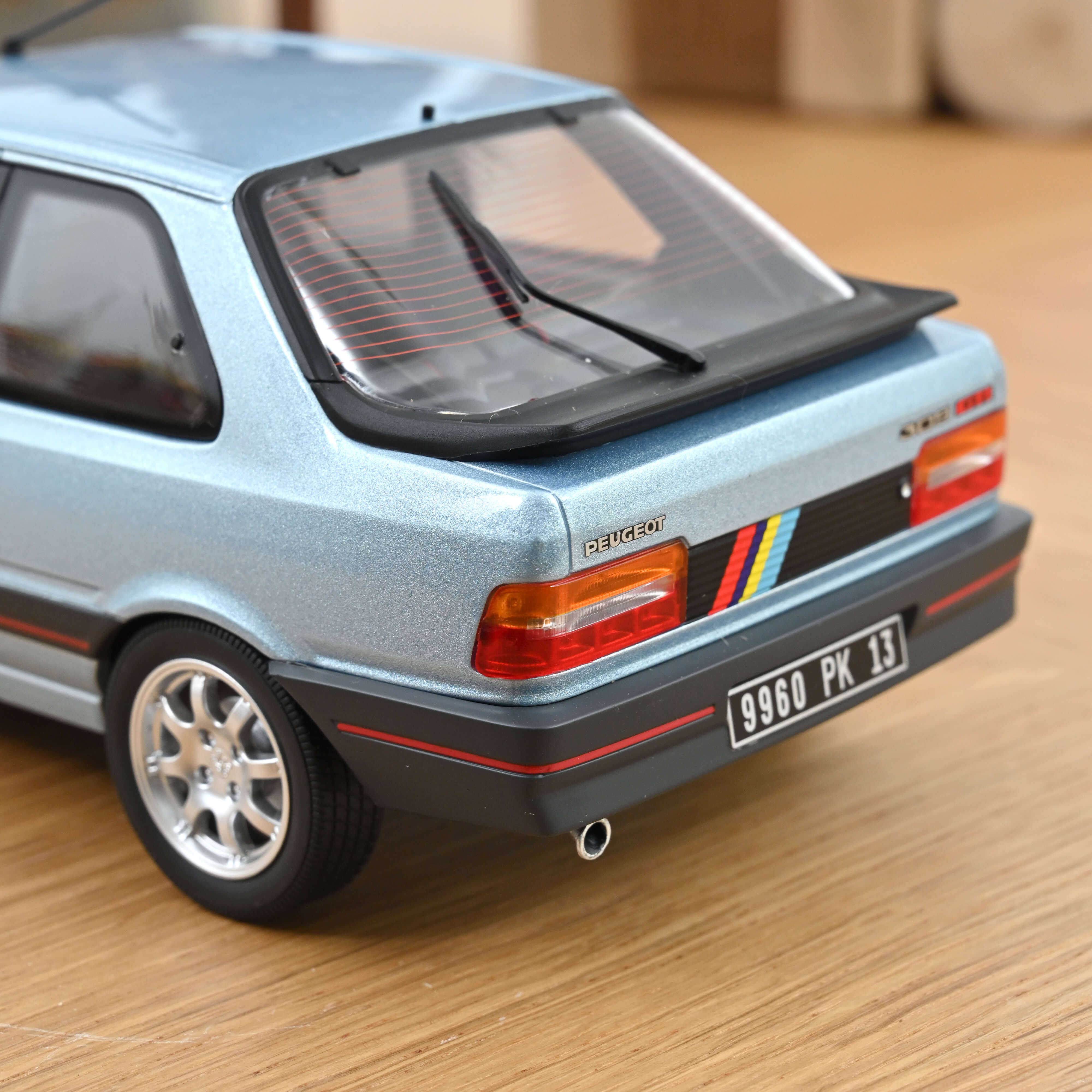 norev-peugeot-309-gti-1988-1-18-modellino-blu-topazio-edizione-300-pz image 4