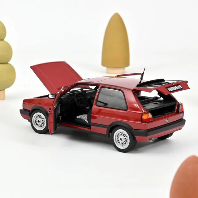 norev-vw-golf-gti-1990-rosso-metallizzato-modellino-auto-1-18 image 1