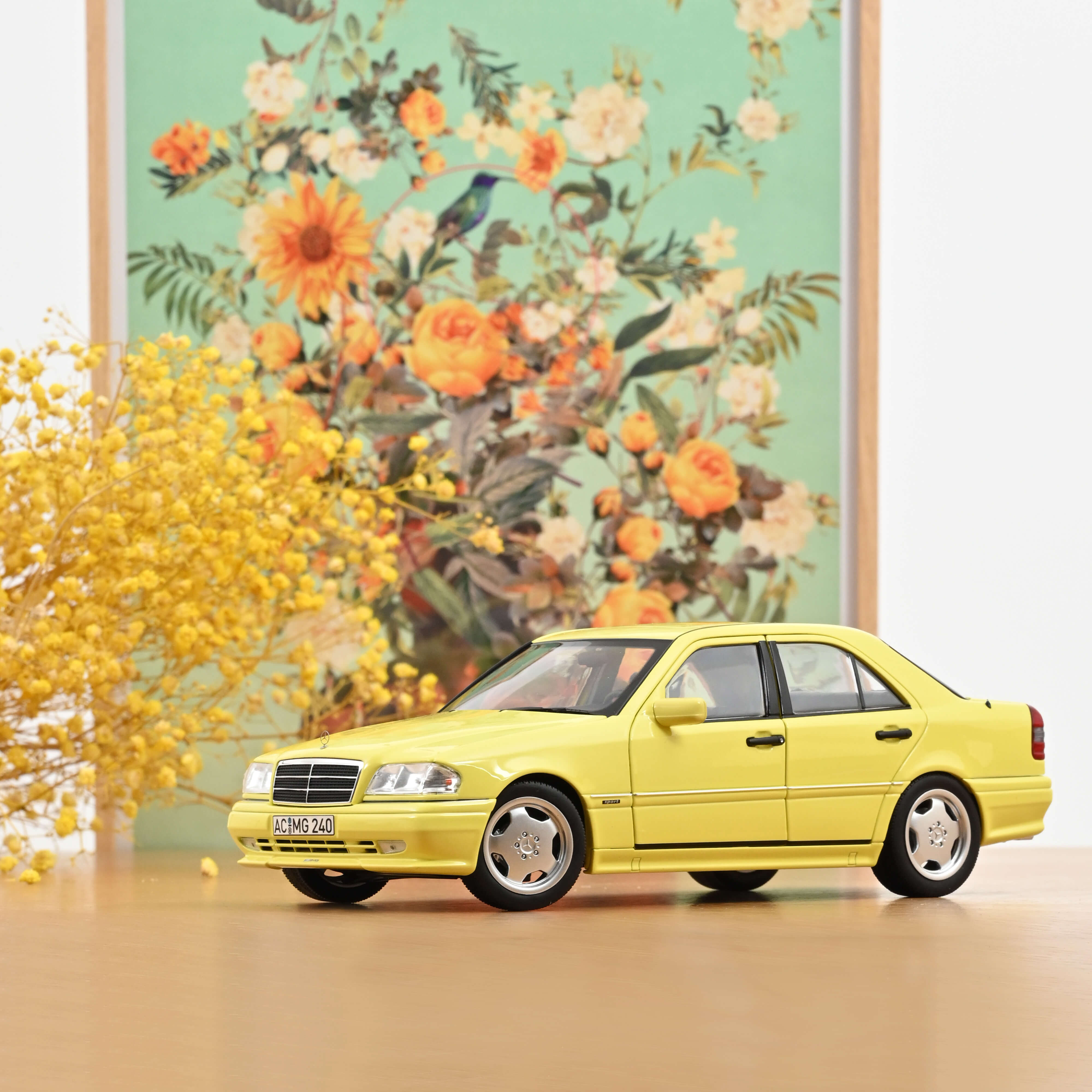 norev-mercedes-benz-c36-amg-1993-1-18-giallo-chiaro-200-pz image 1