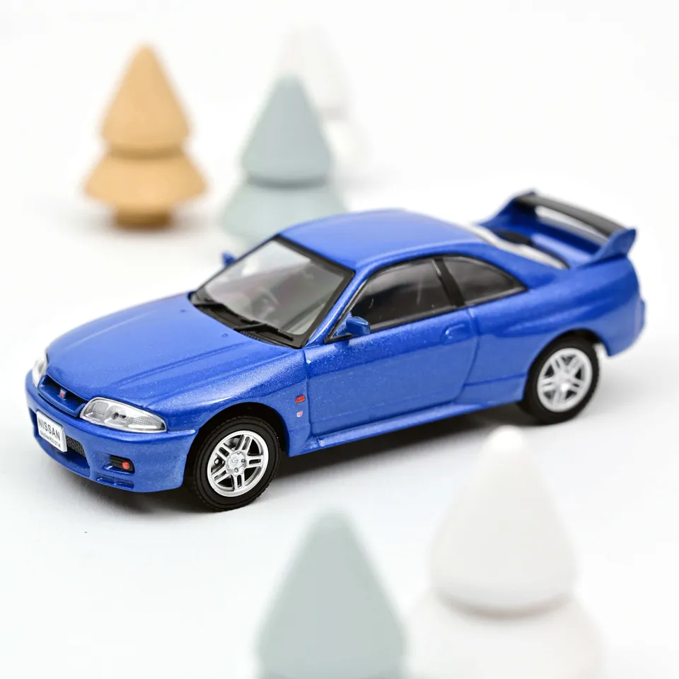 norev-nissan-skyline-r33-gt-r-1995-modellino-auto-1-43-blu-metallizzato image 1