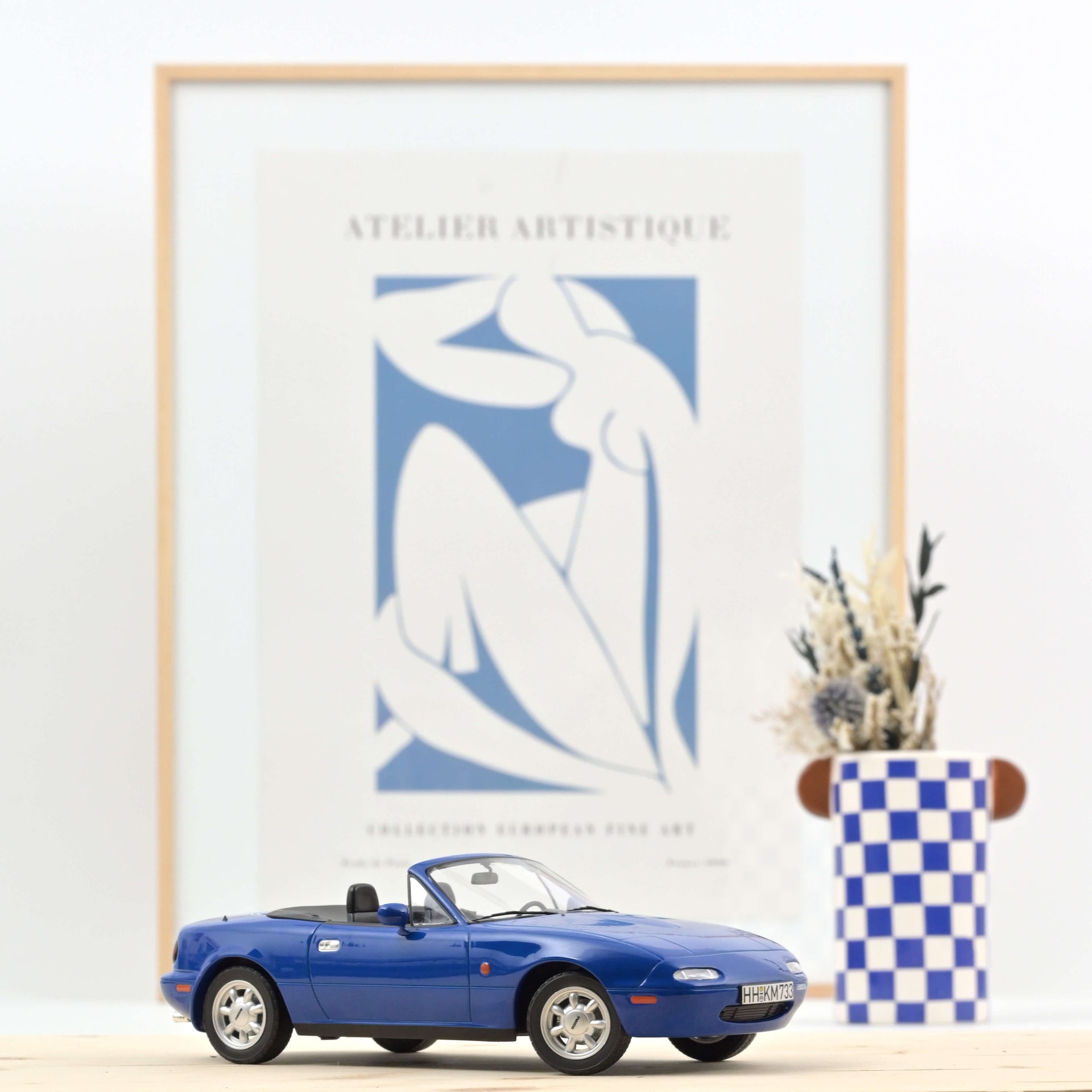 norev-mazda-mx-5-1989-navy-blue-modellino-auto-1-18-100pcs image 1
