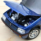 norev-peugeot-205-gti-1-9-1992-auto-in-miniatura-1-18-blu-miami-con-tetto-in-vet image 3