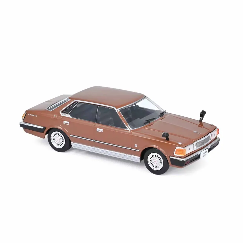 norev-nissan-cedric-430-1979-marrone-1-43-modellino-berlina-giapponese-vintage image 1