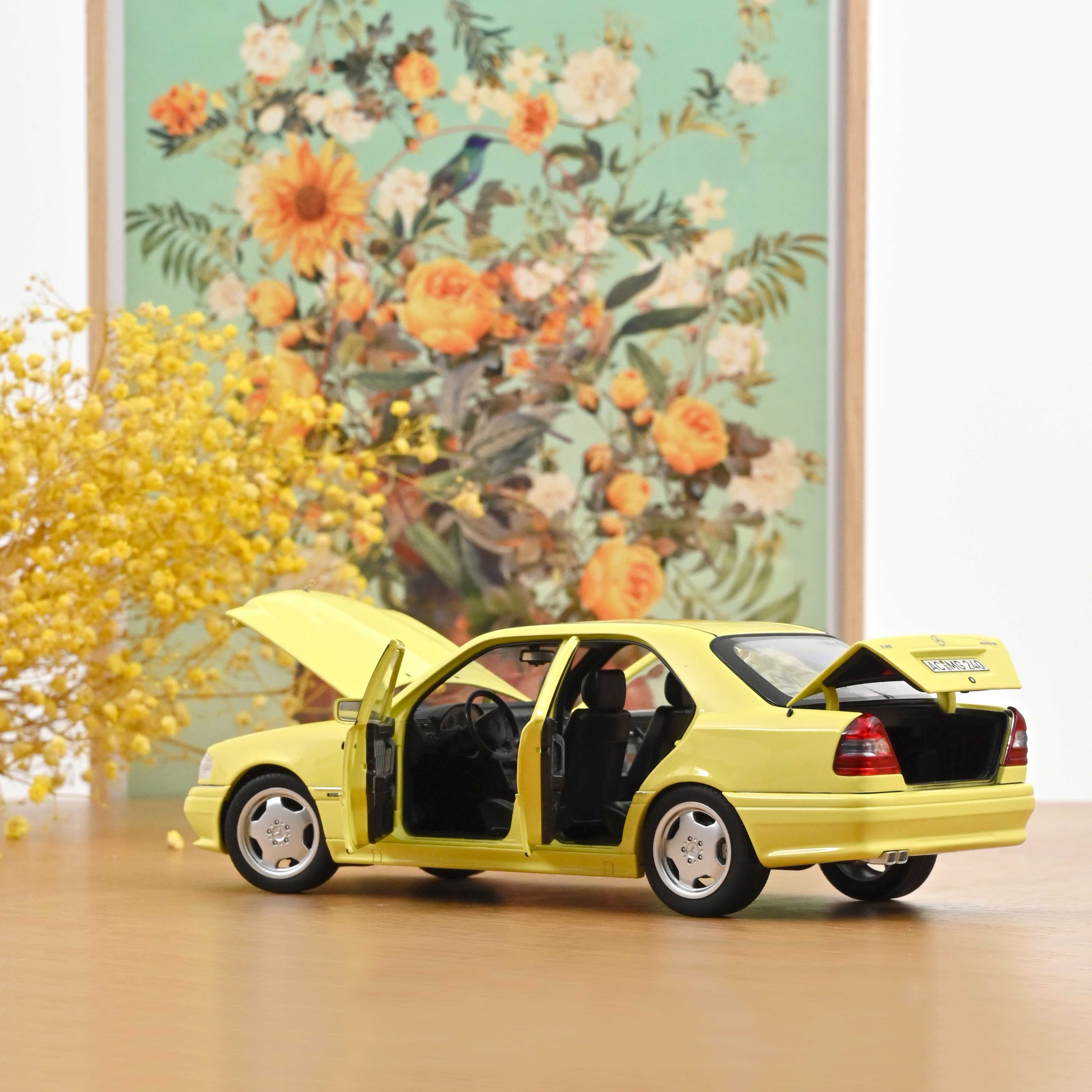 norev-mercedes-benz-c36-amg-1993-1-18-giallo-chiaro-200-pz image 2