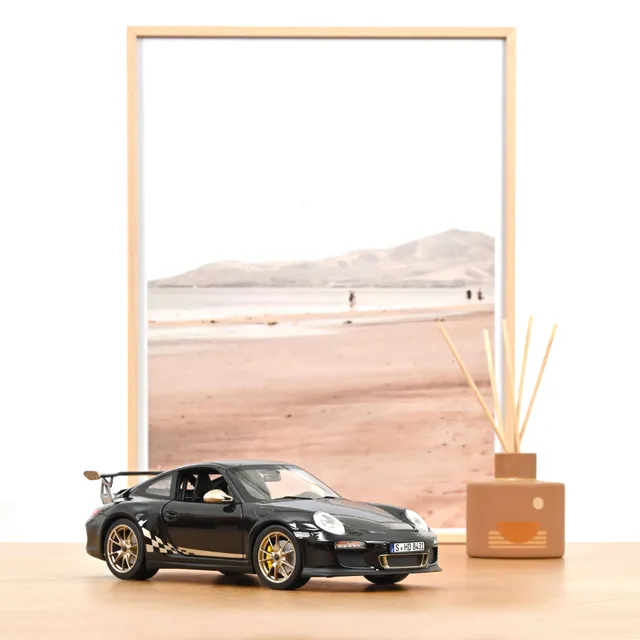 norev-porsche-911-gt3-rs-997-2009-nero-oro-metallizzato-modellino-1-18 image 1