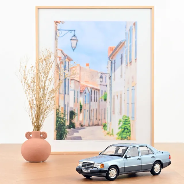 norev-mercedes-benz-230-e-1990-light-blue-metallic-1-18 image 1