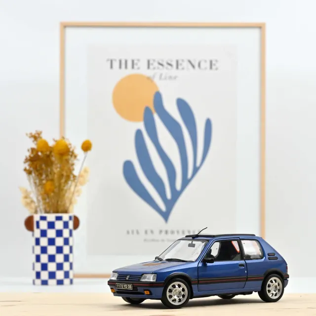 norev-peugeot-205-gti-1-9-1992-auto-in-miniatura-1-18-blu-miami-con-tetto-in-vet image 1