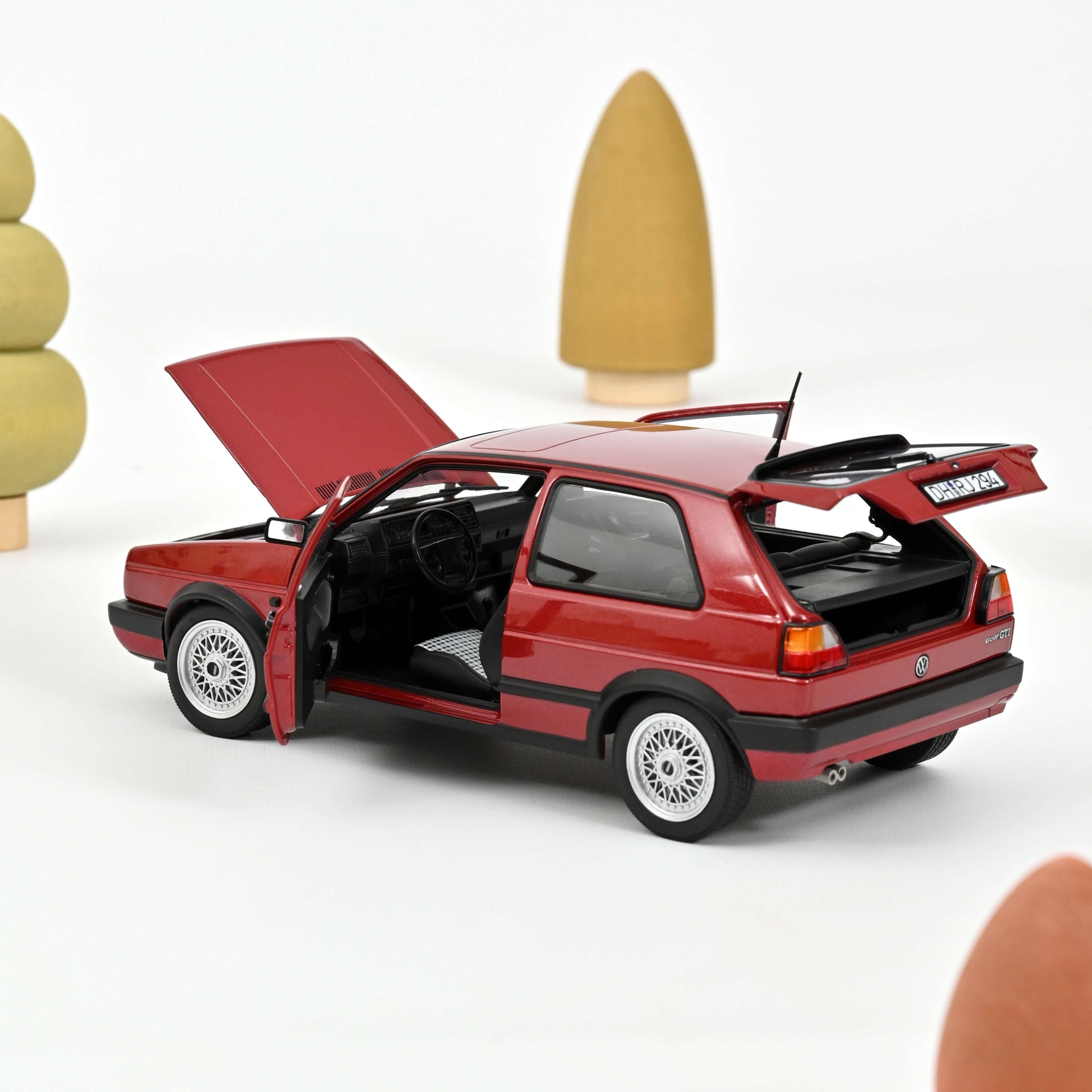 norev-vw-golf-gti-1990-rosso-metallizzato-modellino-auto-1-18 image 1