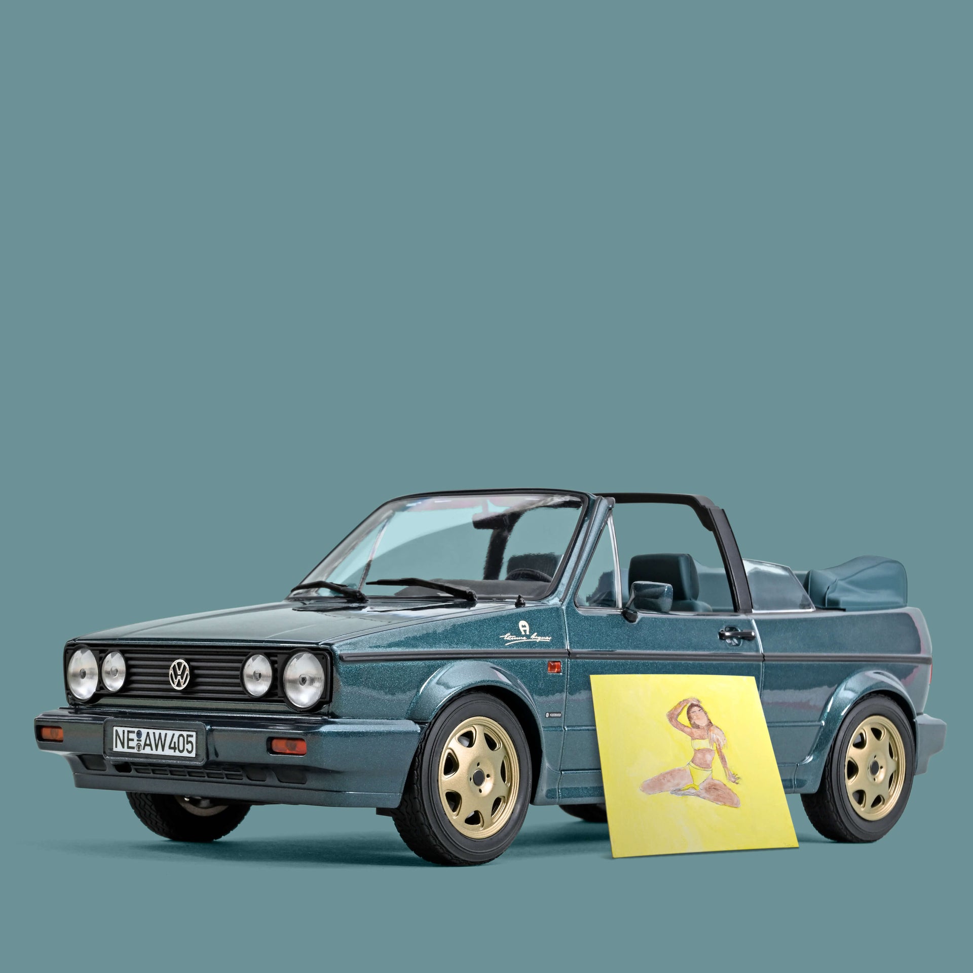 norev-vw-golf-cabriolet-etienne-aigner-1990-automodello-1-18-verde-metallizzato image 1