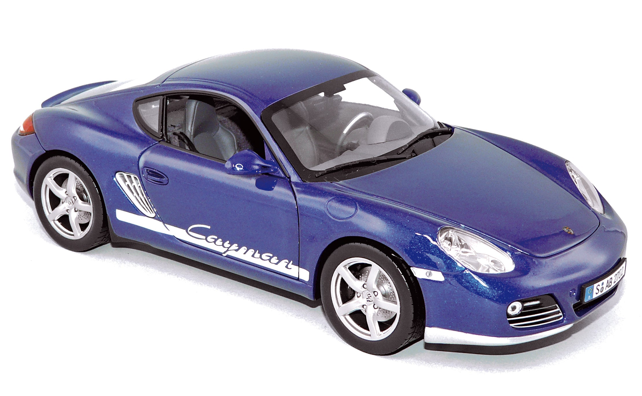 norev-porsche-cayman-2009-blu-metallizzato-1-18-modellino-die-cast image 1