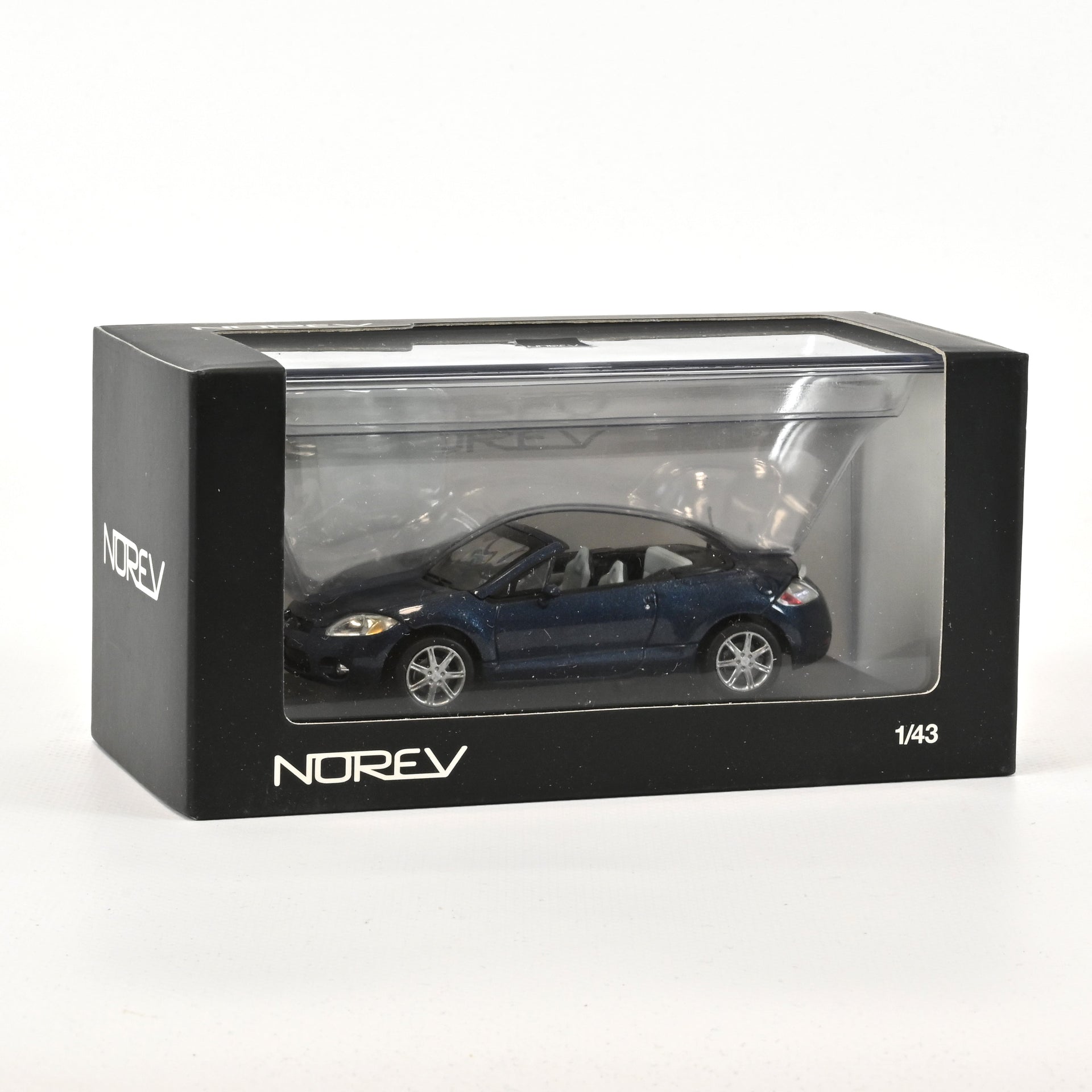 norev-mitsubishi-eclipse-spyder-2006-modellino-auto-1-43-blu image 1