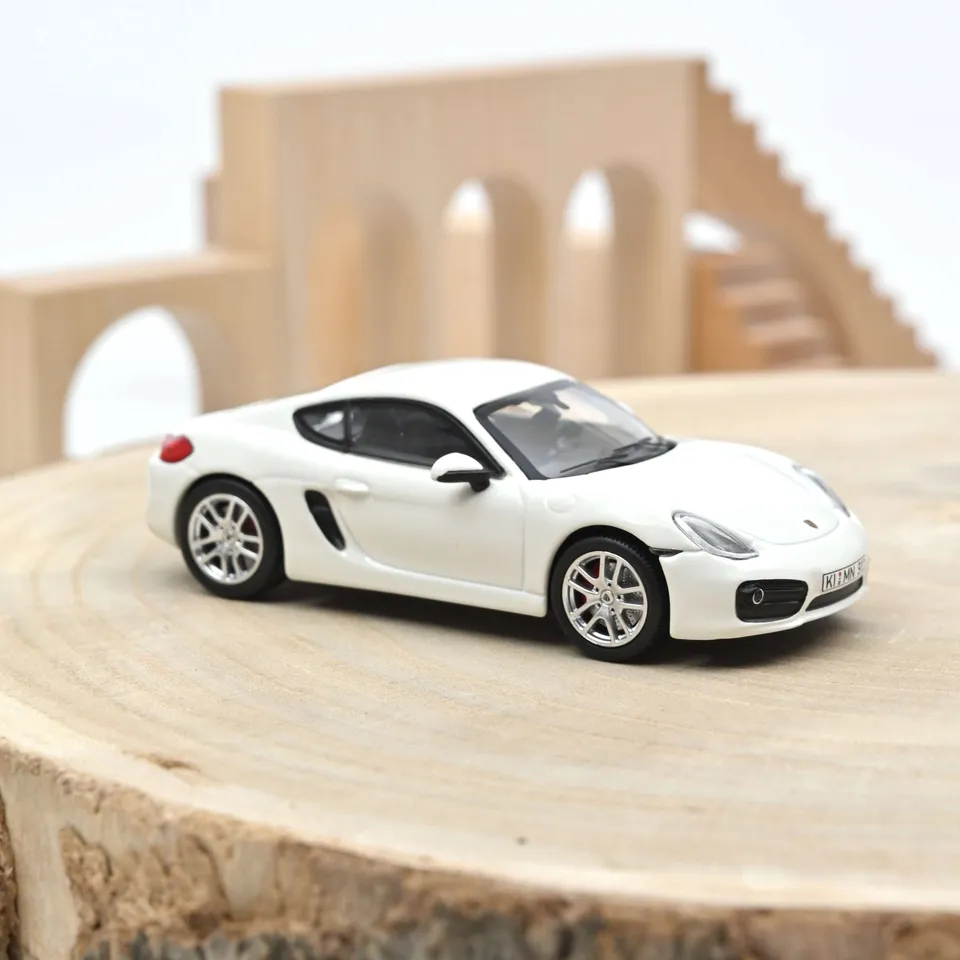 norev-porsche-cayman-s-2013-modellino-auto-1-43-bianco image 1