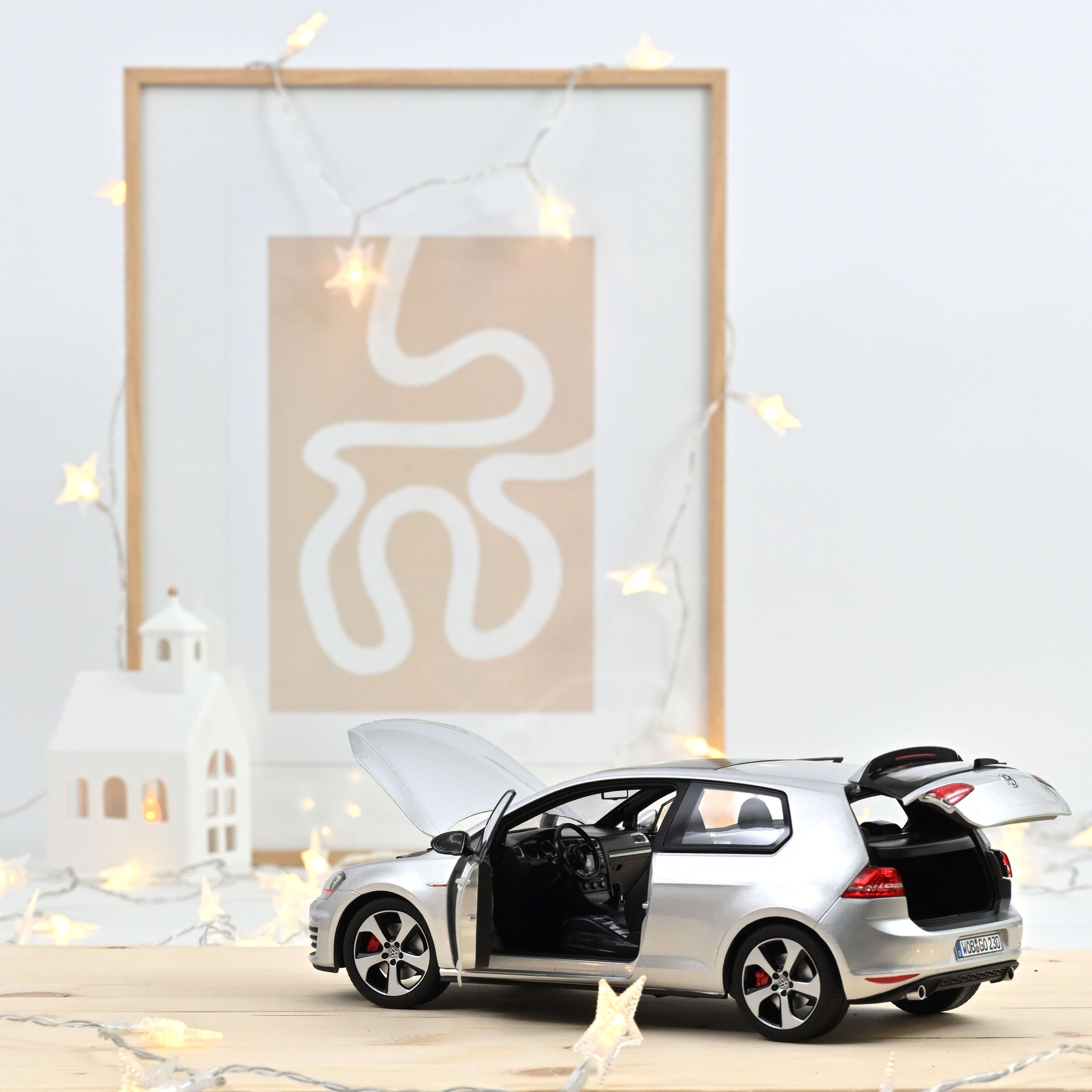 norev-vw-golf-gti-2013-argent-r-flexe-1-18-modellino-auto-jet-car image 2