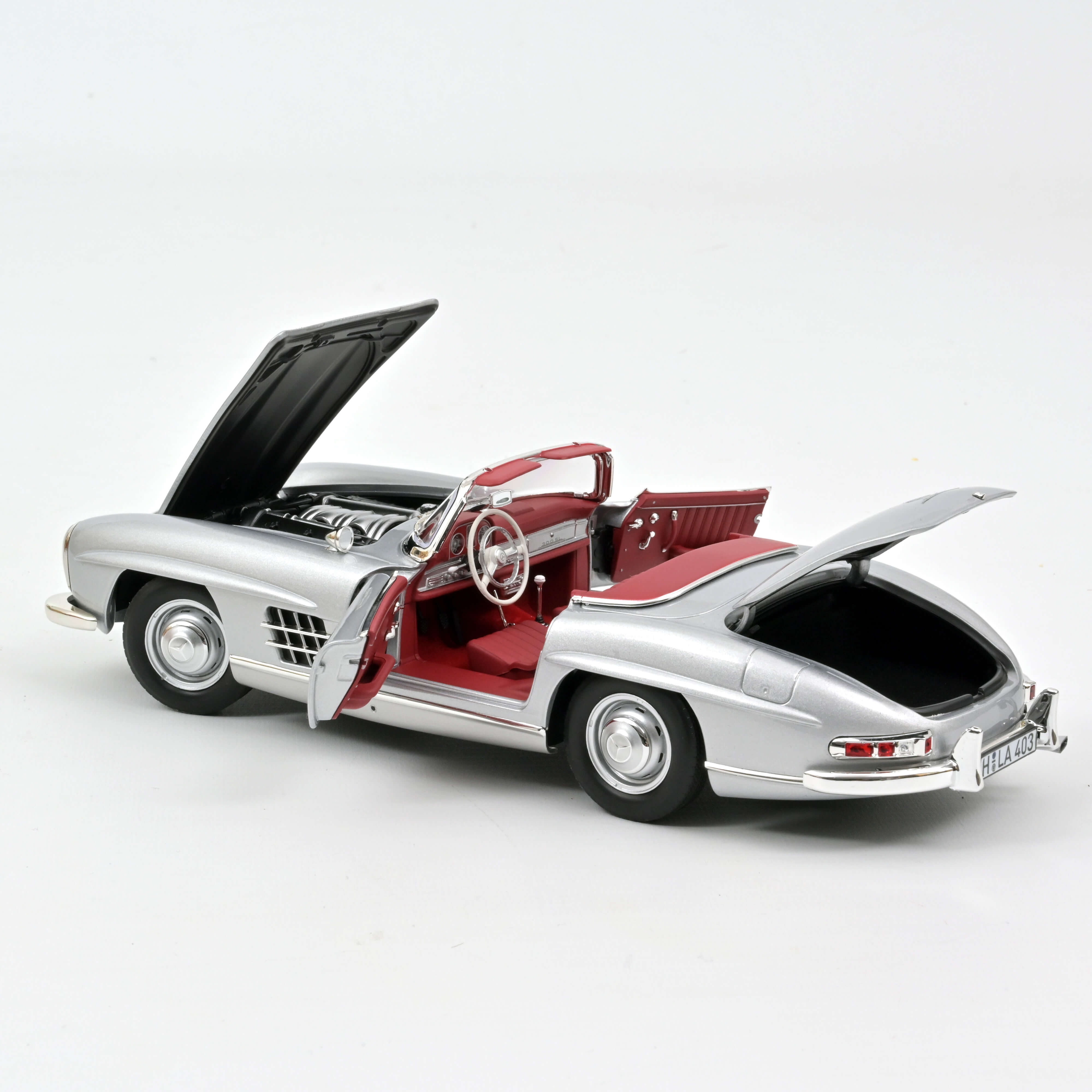 norev-mercedes-benz-300-sl-roadster-1957-argento-1-18 image 5