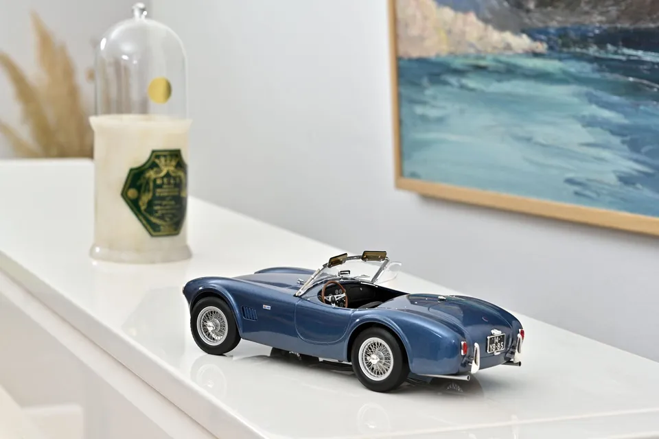 norev-ac-cobra-289-1963-blue-metallic-modellino-auto-1-18 image 1