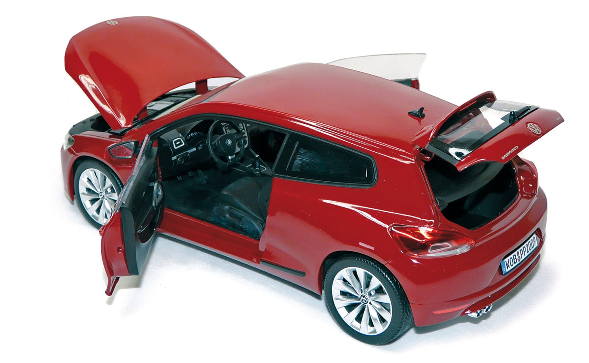 norev-vw-scirocco-2008-rosso-salsa-1-18-modellino-coup image 1