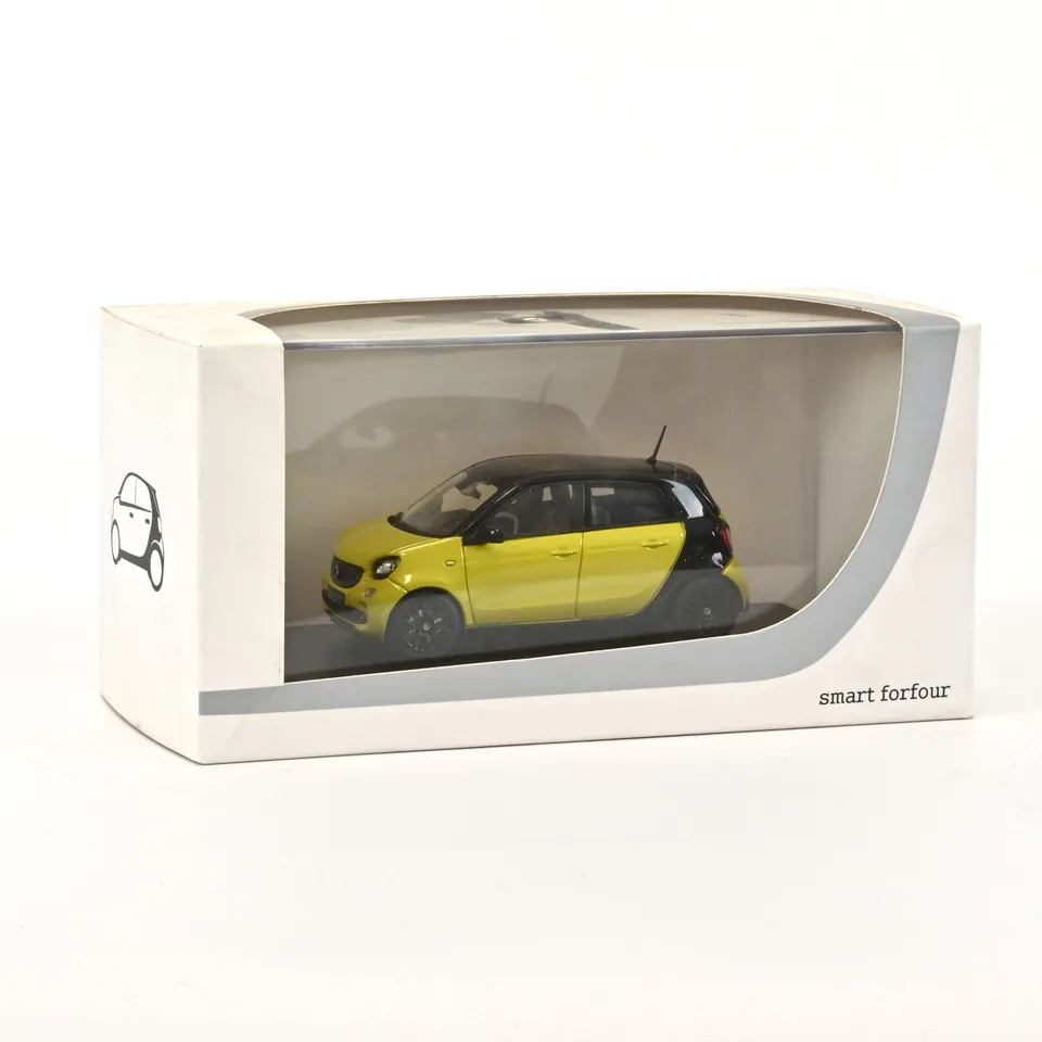 norev-smart-forfour-2015-modellino-auto-1-43-giallo image 1