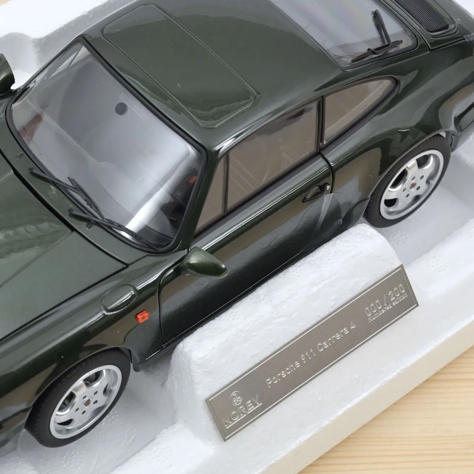 norev-porsche-911-carrera-4-1992-verde-metallizzato-1-18-edizione-200-pezzi image 1