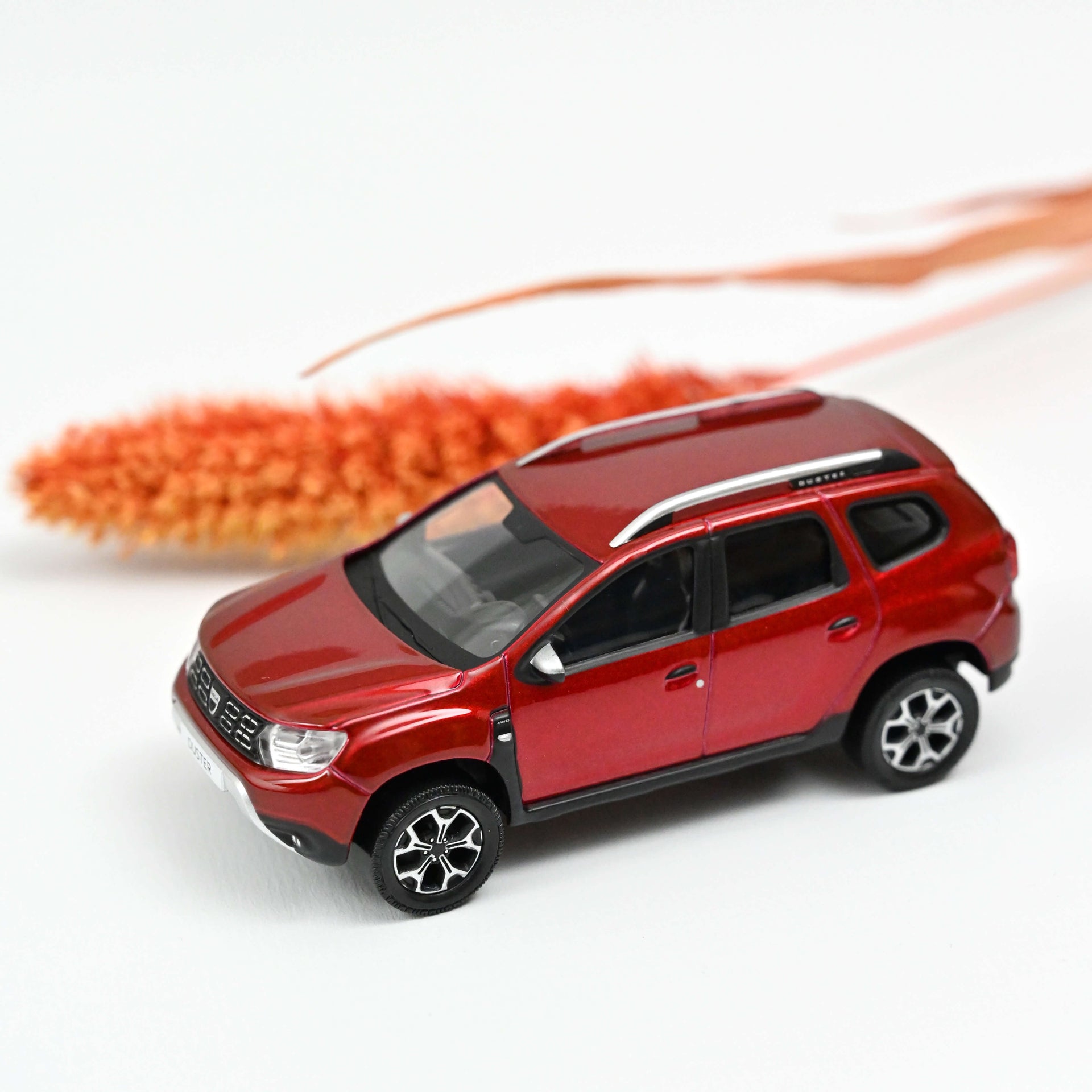 norev-dacia-duster-2018-modellino-auto-1-43-rosso-fiamma image 1