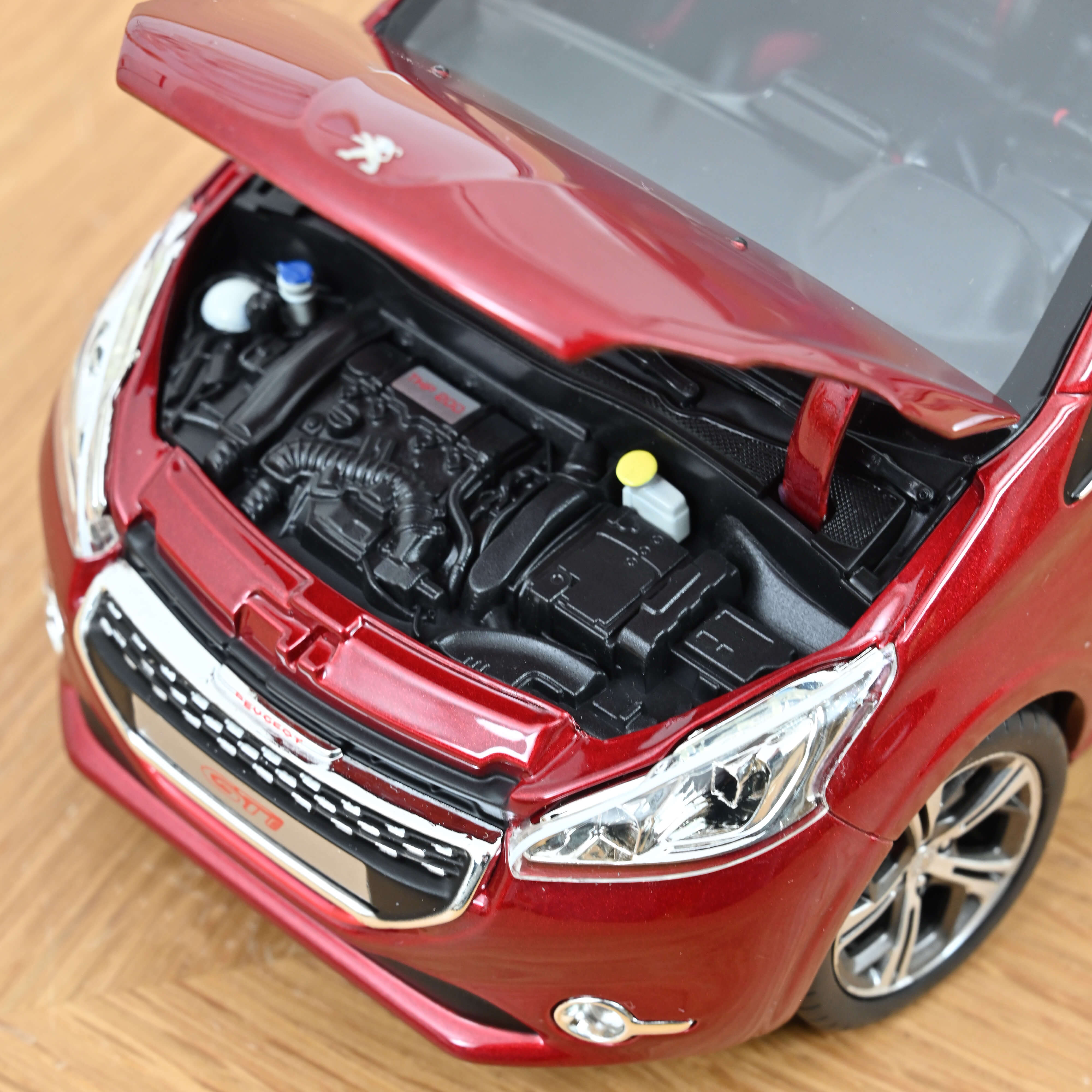 norev-peugeot-208-gti-2013-rouge-rubis-1-18-modellino-novit image 5